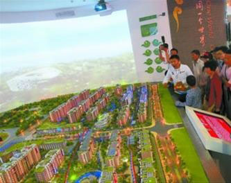 北京案例馆展示了具备30多项环保科技的国奥村