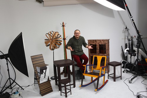 the artist liuyi with his artwork