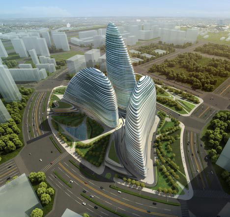 望京soho群将包括三个大的鹅卵石状的建筑物,俯瞰北京首都国际机场的